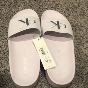 Calvin Klein white slides